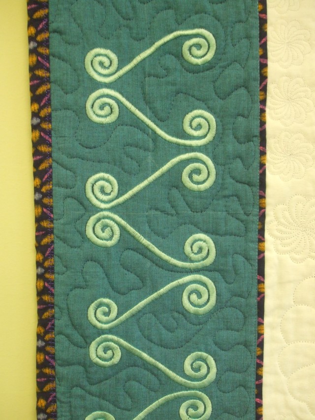 The side borders were 3 GR hoopings each sing clothsetter & printed templates to line up the designs