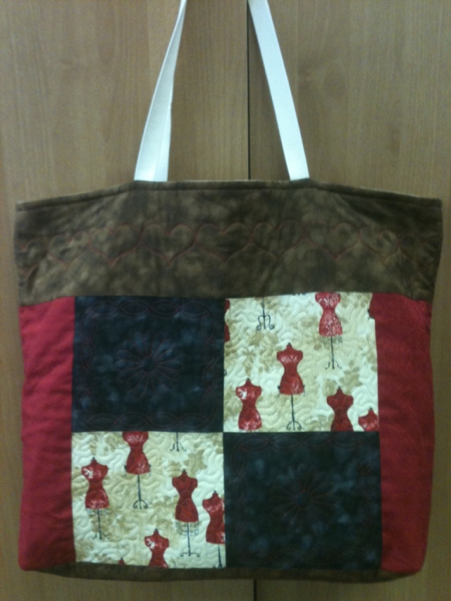 THIS ENTIRE TOTEBAG WAS QUILTED USING THE ACUFIL QUILTING SYSTEM ON OUR JANOME EMBROIDERY MACHINES. THE ACUFIL HOOPS MAKE VERY LIGHT WORK OF ALL YOUR QUILTING PROJECTS!
