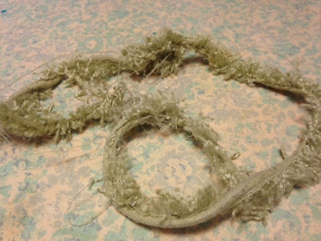 This was what remained of the edging of my bath mat after a "quarrel" with my washing machine?!