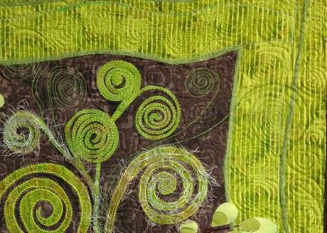 Some of my thread doddlings of spiral fiddlehead fern motifs - a lot of fun